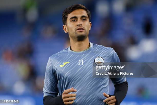 Yan Dhanda of Swansea City warms up prior to the game during the Carabao Cup match between Brighton & Hove Albion and Swansea City at American...