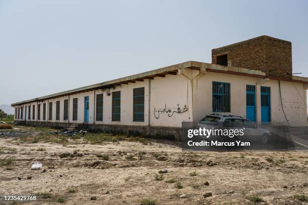 Local building is marked as bobbytrapped with IEDs, and dangerous, in village of Kulangar, near Puli Alam, Afghanistan, Saturday, Sept. 11, 2021....