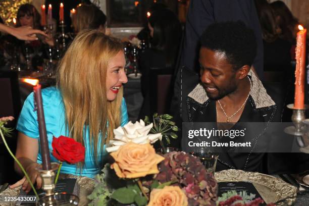 Josephine de La Baume and Omari Douglas attend the Harris Reed x Missoma dinner at Clerkenwell House on September 22, 2021 in London, England.