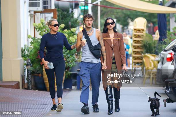 Yolanda Hadid, Anwar Hadid and Dua Lipa are seen on September 21, 2021 in New York City, New York.