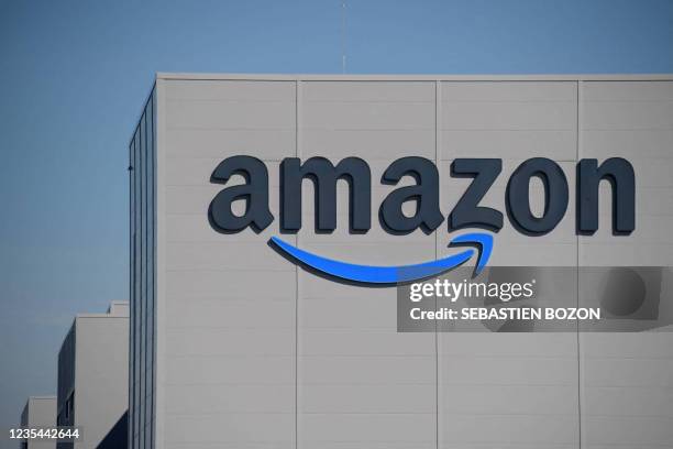 The US giant Amazon logo is pictured on the opening day of a new distribution center in Augny, near Metz, eastern France, on September 23, 2021.