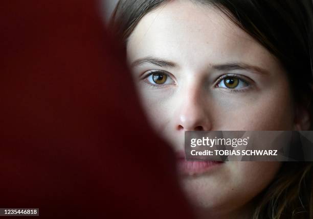 German climate activist Luisa Neubauer from the "Fridays for Future" movement listens to questions during an interview with AFP in Berlin on...