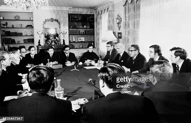 This photo dated 13 January 1973 shows the talks between US delegation leads by Henry Kissinger and North Vietnamese delegation leads by Duc Tho and...
