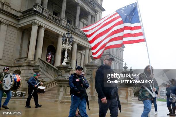 People gather for the 12th annual Second Amendment March sponsored by Michigan Open Carry, Inc and Second Amendment March outside of the Michigan...