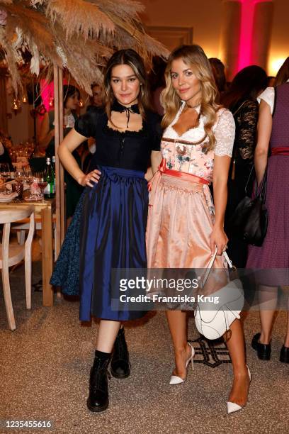 Emily Roberts and Ina Aogo during the Madlwiesn 2021 at Hotel De Rome on September 23, 2021 in Berlin, Germany.