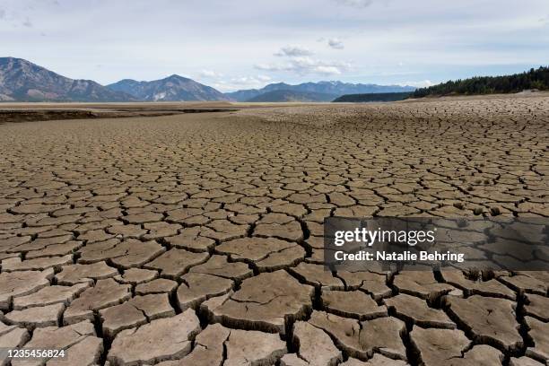 Parched lake bed at the nearly empty Palisades Reservoir on September 23, 2021 near Irwin, Idaho. Following a season's long drought, the reservoir on...