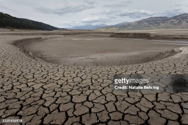 Parched lake bed at the nearly empty Palisades Reservoir on September 23, 2021 near Irwin, Idaho. Following a season's long drought, the reservoir on...