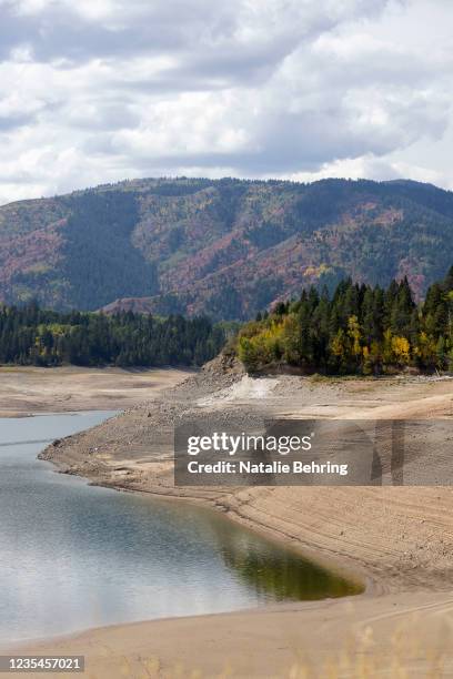 Nearly empty Palisades Reservoir is seen from an overlook on September 23, 2021 near Irwin, Idaho. Following a season's long drought, the reservoir...