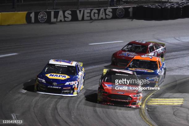 Taylor Gray Ford Performance Ford Fusion leads the field through turn 1 and battles with Jesse Love NAPA Auto Parts Toyota Camry during the Star...