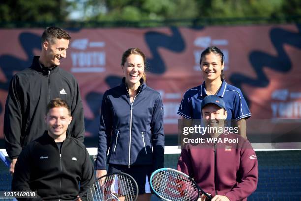 Catherine, Duchess of Cambridge poses with US Open Champion Emma Raducanu at the LTA Centre in Roehampton on September 24, 2021 in London, England.