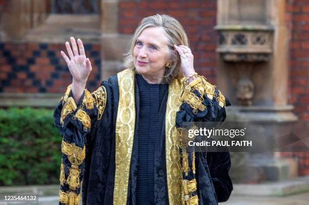 Former United States Secretary of State, Hilary Clinton gestures after being officially installed as Queen's University's 11th chancellor and the...