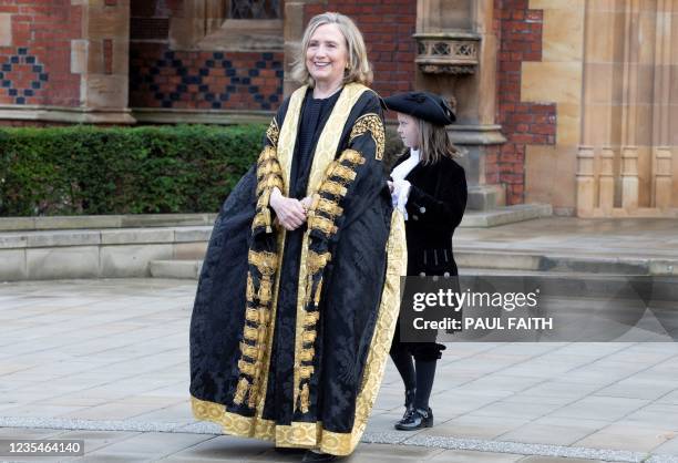 Former United States Secretary of State, Hilary Clinton gestures after being officially installed as Queen's University's 11th chancellor and the...