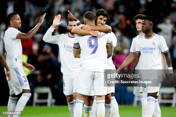 Marco Asensio of Real Madrid celebrates goal 4-1 with Karim Benzema of Real Madrid during the La Liga Santander match between Real Madrid v Real...