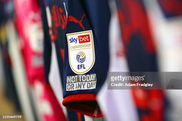SKYBet EFL logo on a players shirt hanging in the dressing room along with the anti-racism message "Not Today Or Any Day" ahead of the Sky Bet...