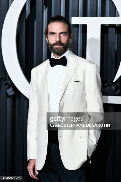 French hairdresser John Nollet poses during the annual gala for the season opening at the Opera Garnier in Paris, on September 24, 2021.
