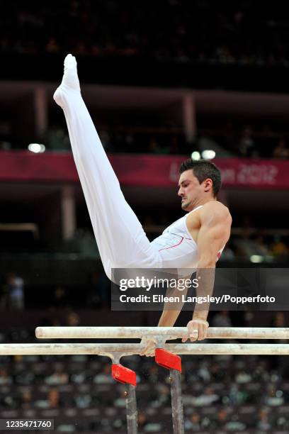 Hamilton Sabot representing France competing on parallel bars in the mens artistic individual apparatus final during day 11 of the 2012 Summer...