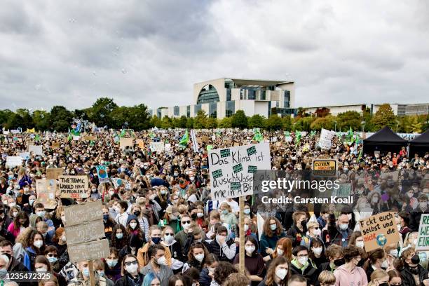 Climate activists gatzher for a large-scale climate strike march by Fridays for Future on September 24, 2021 in Berlin, Germany. Germany is to hold...