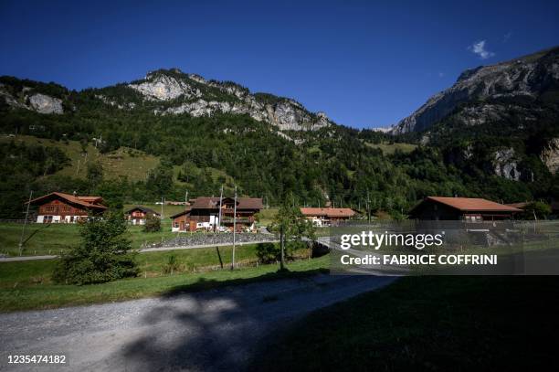 Picture taken on September 24, 2021 shows houses of the Swiss village of Mitholz, Berner Oberland. - The tiny Swiss village will have to be evacuated...