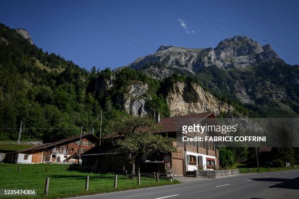 Picture taken on September 24, 2021 shows houses in the Swiss village of Mitholz. - The tiny Swiss village of Mitholz will have to be evacuated from...