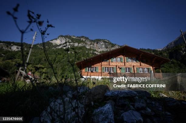 Picture taken on September 24, 2021 shows a house in the Swiss village of Mitholz. - The tiny Swiss village of Mitholz will have to be evacuated from...