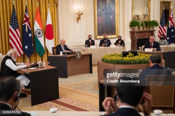 President Joe Biden, second left, hosts a meeting with Narendra Modi, India's prime minister, left, Yoshihide Suga, Japan's prime minister, bottom...