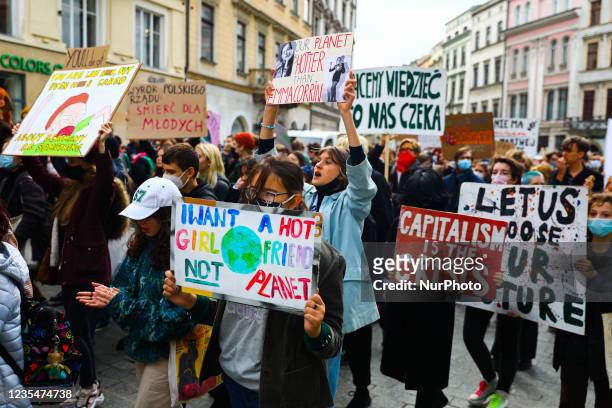 Students and supporters attend Climate Strike protest organized by Fridays for Future movement also known as Youth Strike for Climate. Krakow, Poland...