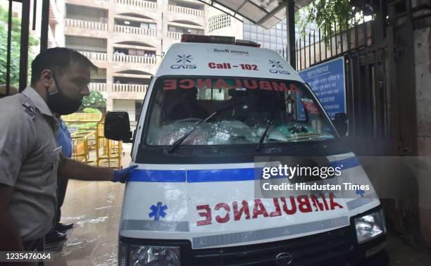 Ambulance carrying the bodies after a gangster and his two assailants were killed in firing at Rohini district court on September 24, 2021 in New...