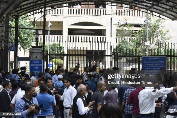 Members of the media gather outside the to the Rohini district court on September 24, 2021 in New Delhi, India. Earlier in the day, gangster Jitender...