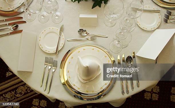 round table setting - cutlery table stock pictures, royalty-free photos & images