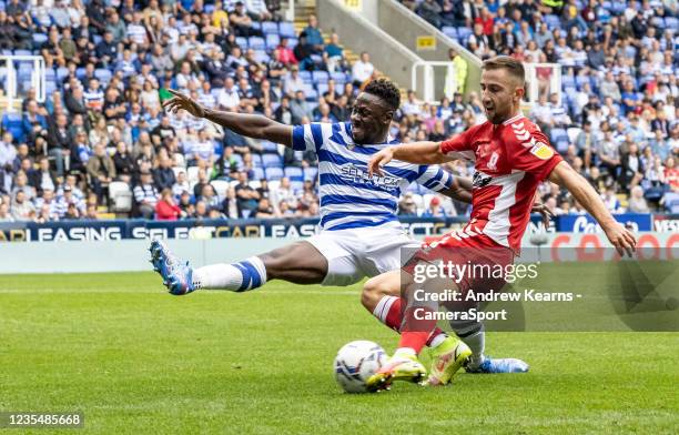 Middlesbrough's Andraz Sporar shoots at goal under pressure from Reading United's Andy Yiadomduring the Sky Bet Championship match between Reading...