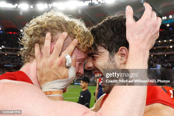 Clayton Oliver and Christian Petracca of the Demons celebrate during the 2021 Toyota AFL Grand Final match between the Melbourne Demons and the...