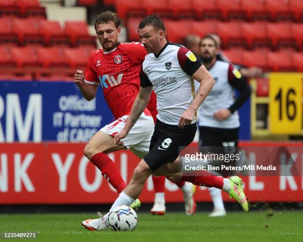 Alex Gilbey of Charlton Athletic and Ryan Tunnicliffe of Portsmouth during the Sky Bet League One match between Charlton Athletic and Portsmouth at...