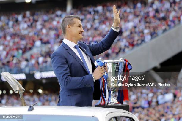 Glen Jackovich arrives with the Premiership Cup during the 2021 Toyota AFL Grand Final match between the Melbourne Demons and the Western Bulldogs at...