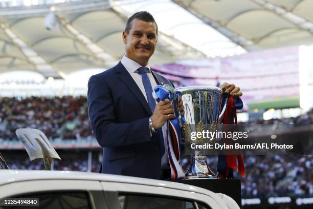 Glen Jackovich arrives with the Premiership Cup during the 2021 Toyota AFL Grand Final match between the Melbourne Demons and the Western Bulldogs at...