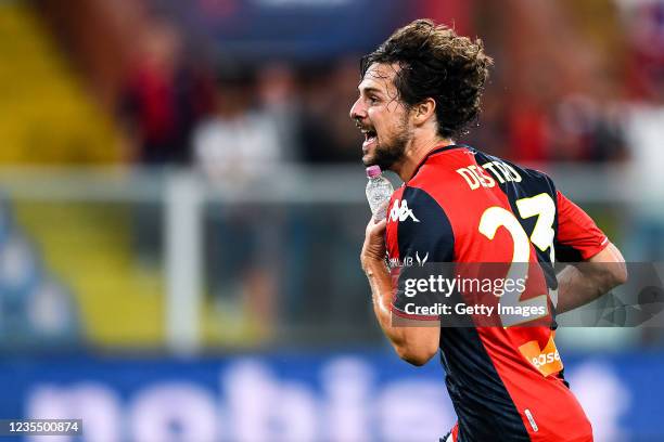 Mattia Destro of Genoa celebrates after scoring his second goal holding a bottle of water during the Serie A match between Genoa CFC and Hellas...