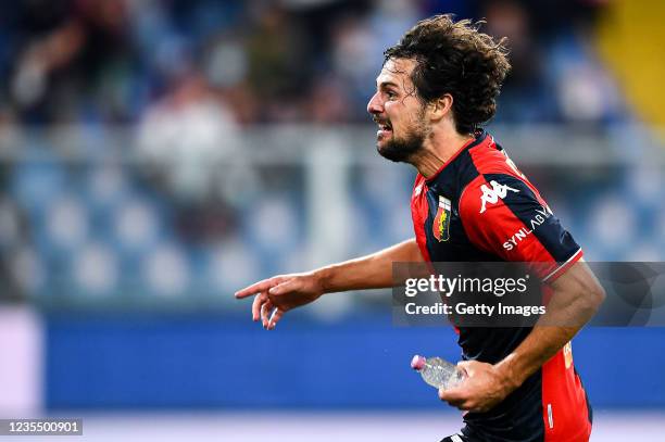 Mattia Destro of Genoa celebrates after scoring his second goal holding a bottle of water during the Serie A match between Genoa CFC and Hellas...