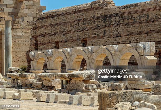 Picture shows arches bearing carved Gorgon heads surrounding the Severin forum, in the ancient Roman city of Leptis Magna, near the coastal Libyan...