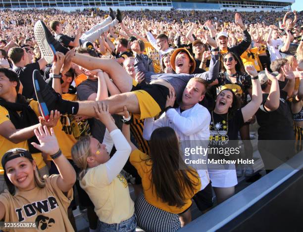 Fans of the Iowa Hawkeyes cheer in the student section during the first half against the Colorado State Rams at Kinnick Stadium on September 25, 2021...