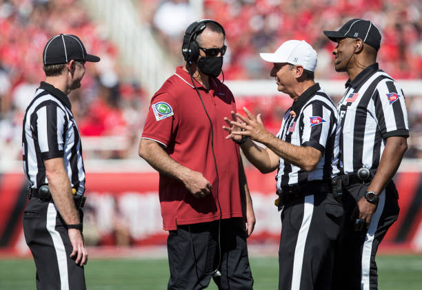 Nick Rolovich head coach of the Washington State Cougars talks with officials during their game against the Utah Utes September 25, 2021 at Rice...