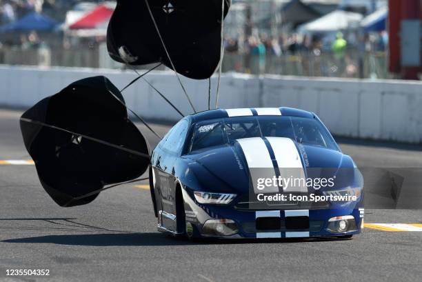 The parachutes come out on the Fernando Cuadra Jr Columbio IMPEX Ford Mustang Pro Stock Dragster during qualifying for the NHRA Midwest National on...
