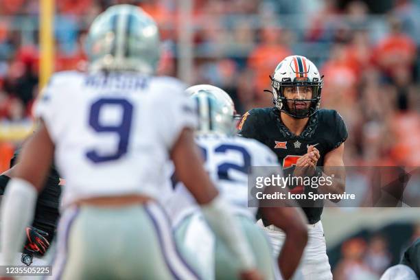 Oklahoma State Cowboys quarterback Spencer Sanders gets ready to take the snap against the Kansas State Wildcats on September 25th, 2021 at Boone...