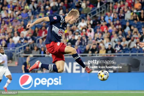 New England Revolution forward Adam Buksa scores the first goal of the game during a match between the New England Revolution and Orlando City SC on...