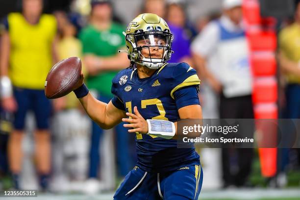 Georgia Tech quarterback Jordan Yates drops back to pass during the NCAA football game between the North Carolina Tar Heels and Georgia Tech Yellow...