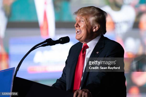 Former US President Donald Trump speaks at a rally on September 25, 2021 in Perry, Georgia. Republican Senate candidate Herschel Walker, Georgia...