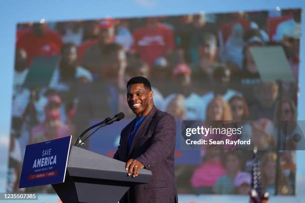 Republican Senate candidate Herschel Walker speaks at a rally featuring former US President Donald Trump on September 25, 2021 in Perry, Georgia....