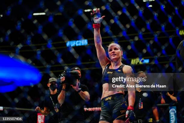 Valentina Shevchenko celebrates after defeating Lauren Murphy in their Flyweight title fight during UFC 266 at T-Mobile Arena on September 25, 2021...