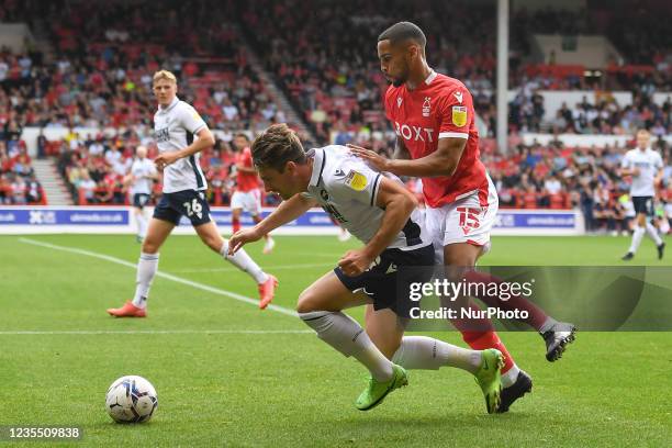 Ryan Leonard of Millwall shields the ball from Max Lowe of Nottingham Forest during the Sky Bet Championship match between Nottingham Forest and...