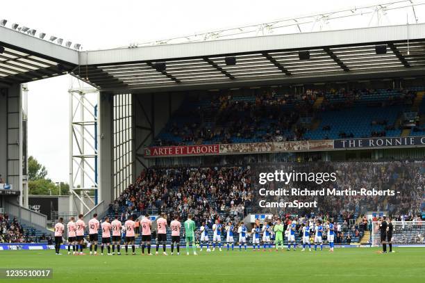 The Blackburn Rovers and Cardiff City players acknowledge a minutes applause for the late Jimmy Greaves during the Sky Bet Championship match between...