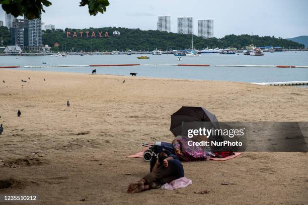 Homeless people on the beach in Pattaya. The Thai government has pushed back plans to reopen Pattaya and other major cities in the country to...