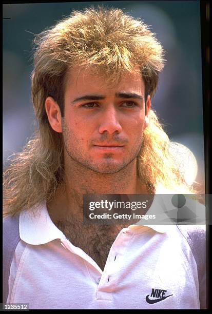 ANDRE AGASSI OF THE UNITED STATES LOOKS THOUGHTFUL AT THE 1989 ITALIAN OPEN.
